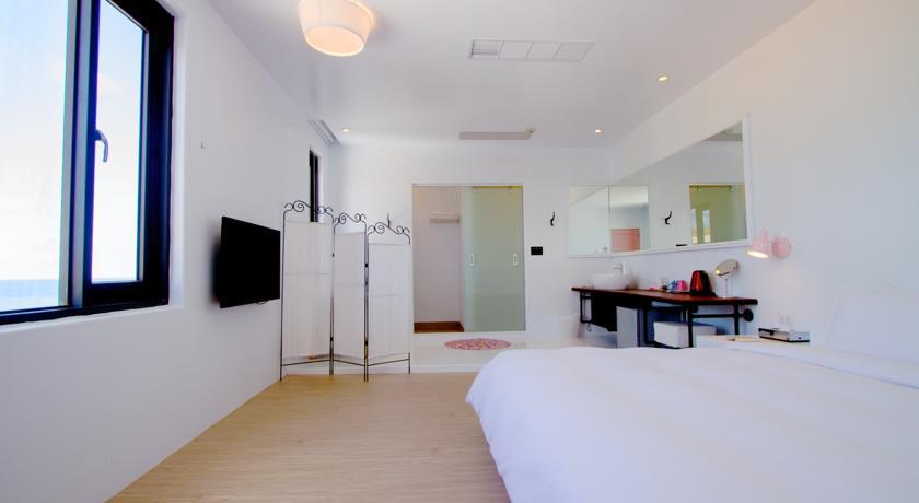 Sea Shore Hotel Manzhou Habitación foto