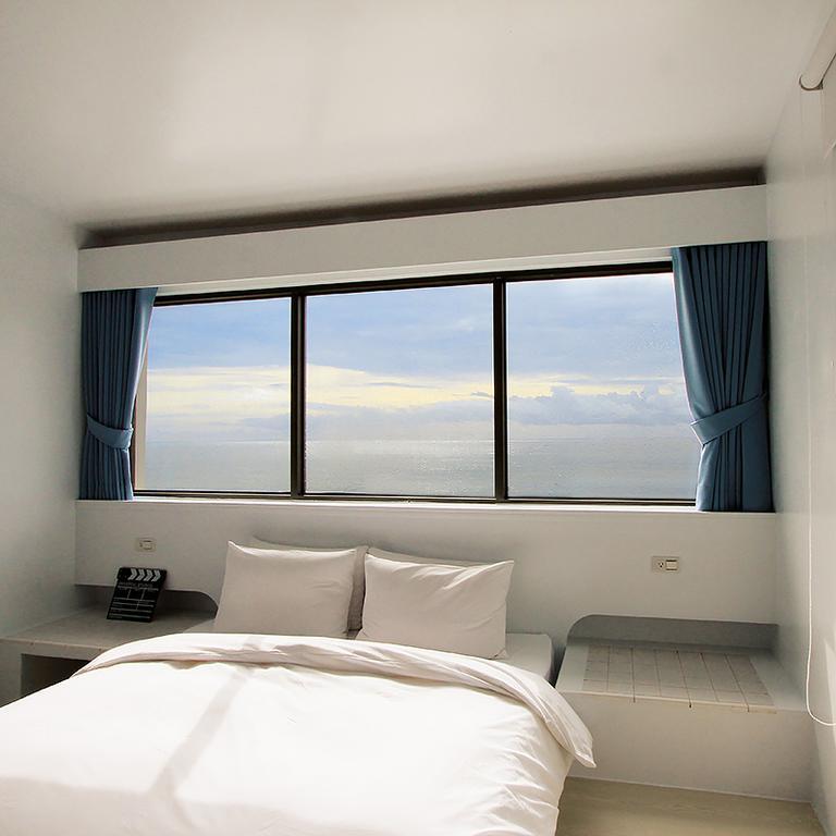 Sea Shore Hotel Manzhou Habitación foto