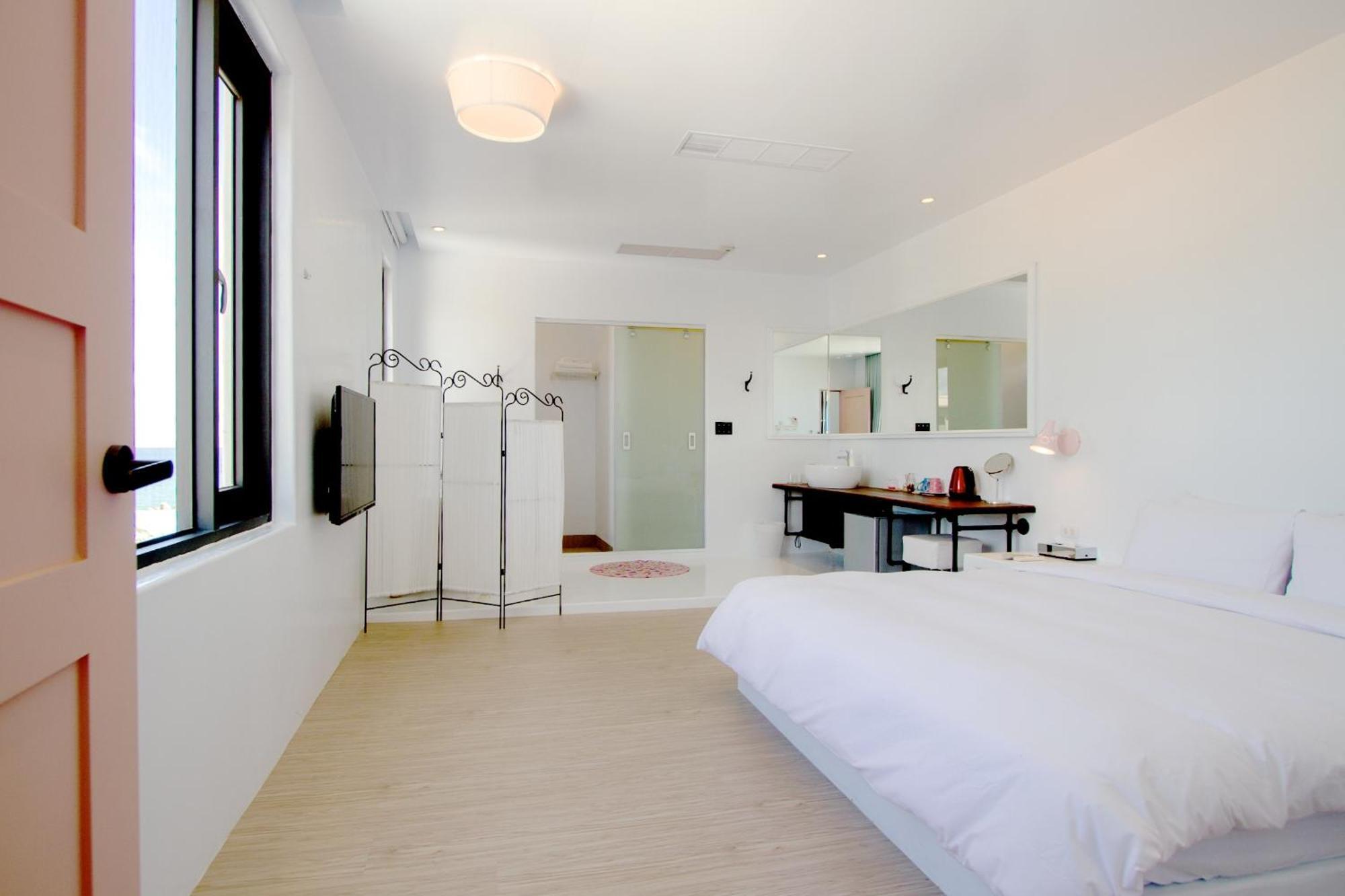 Sea Shore Hotel Manzhou Habitación foto