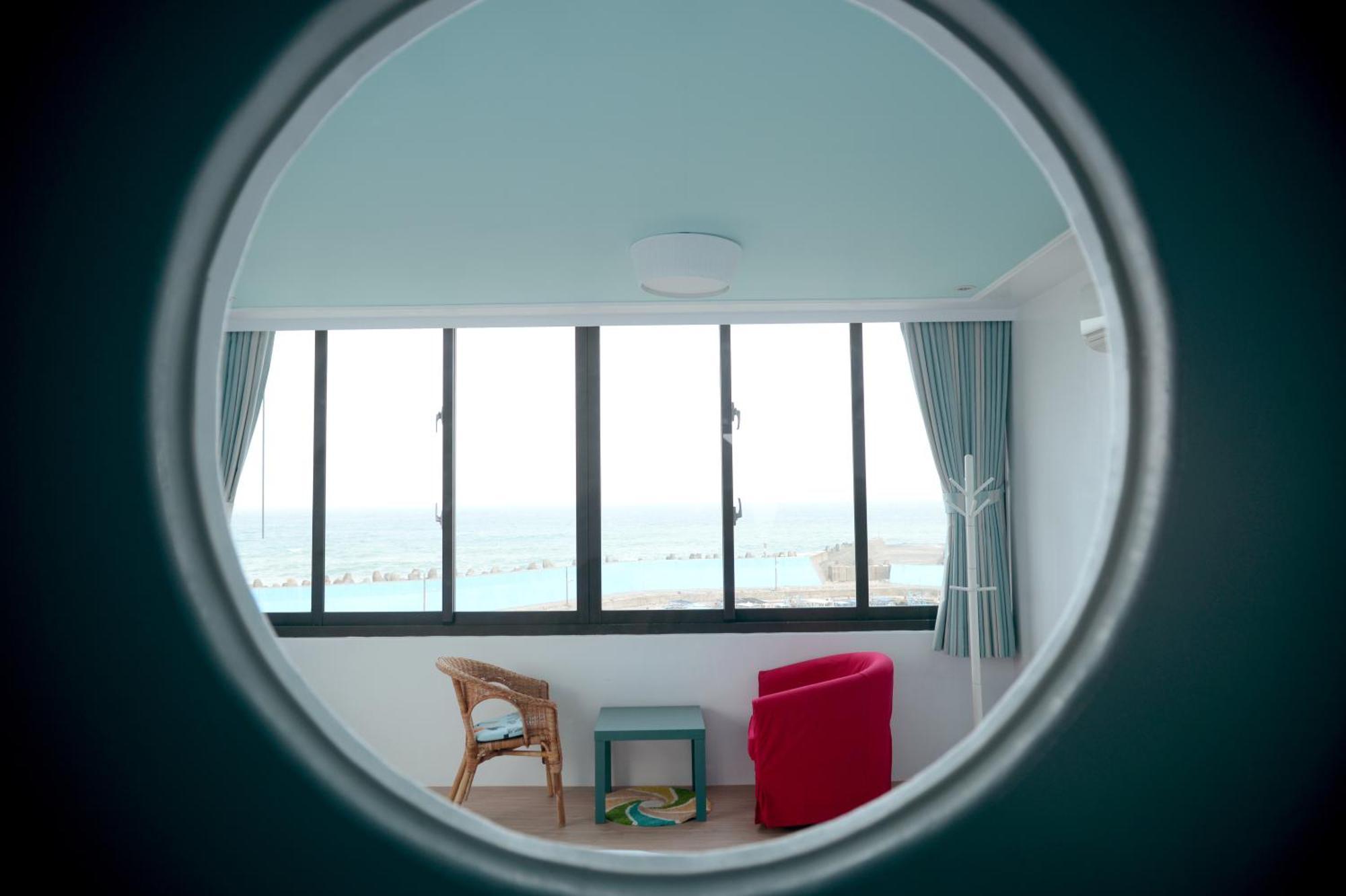 Sea Shore Hotel Manzhou Habitación foto