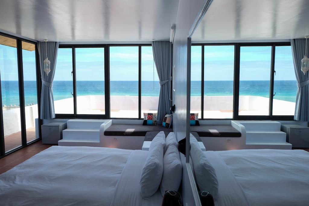Sea Shore Hotel Manzhou Habitación foto
